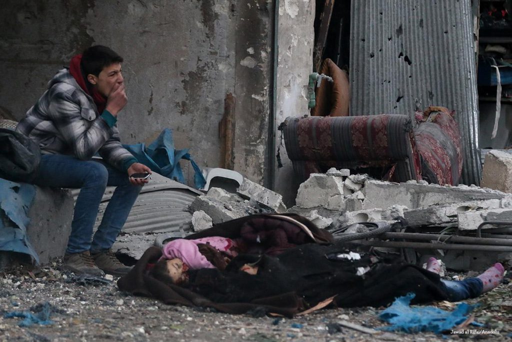 2016 11 30 Syrian Man Cries Near A Dead Body Of A Girl After War Crafts Belonging To The Assad Regime Forces Carried Out Airstrikes 1